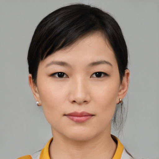Neutral asian young-adult female with medium  black hair and brown eyes