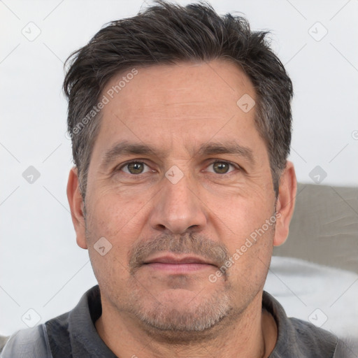 Neutral white adult male with short  brown hair and brown eyes