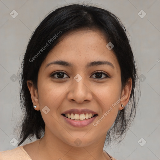 Joyful latino young-adult female with medium  black hair and brown eyes