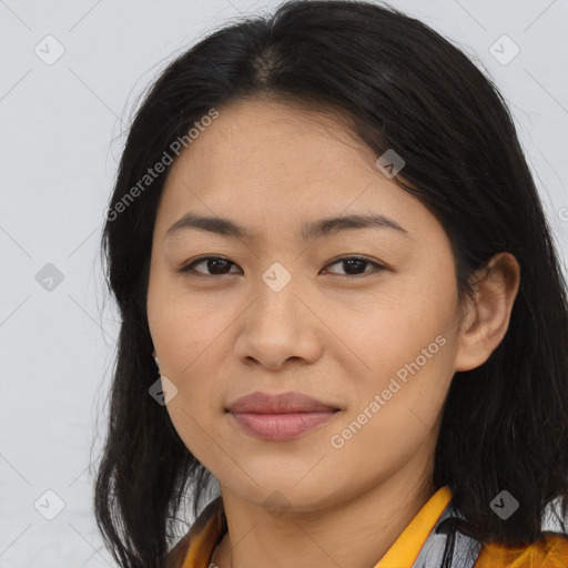 Joyful asian young-adult female with long  brown hair and brown eyes