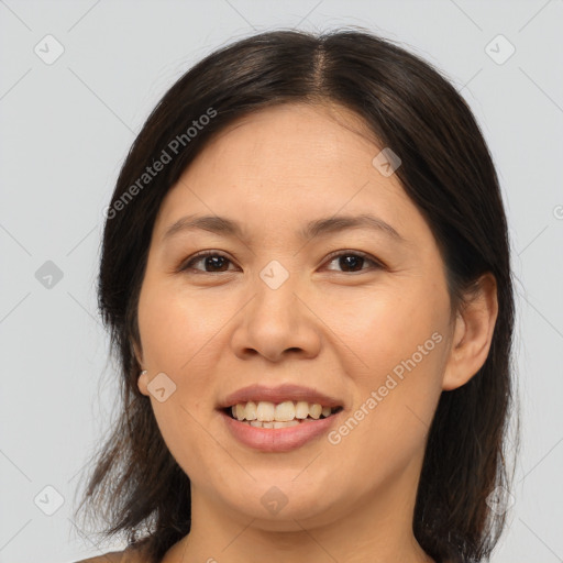 Joyful asian young-adult female with medium  brown hair and brown eyes