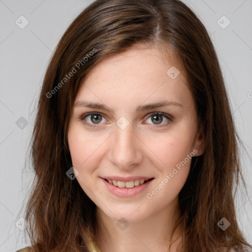 Joyful white young-adult female with long  brown hair and grey eyes