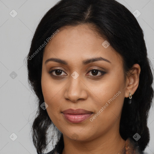 Joyful latino young-adult female with long  brown hair and brown eyes