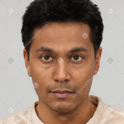 Neutral latino young-adult male with short  black hair and brown eyes