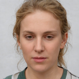 Neutral white young-adult female with medium  brown hair and grey eyes