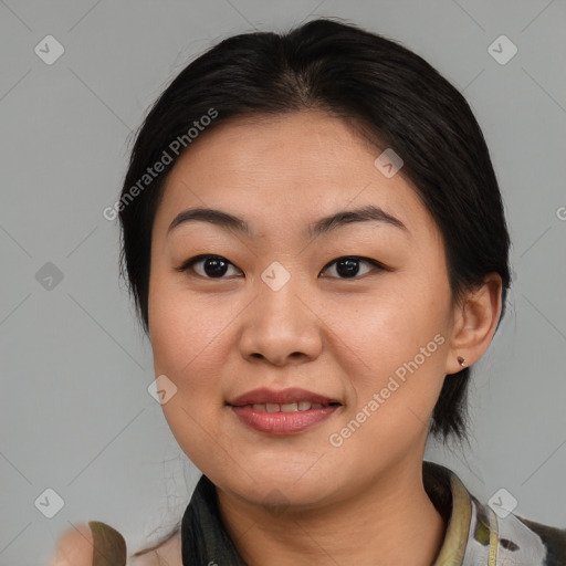 Joyful asian young-adult female with medium  brown hair and brown eyes