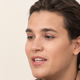 Joyful white young-adult male with medium  brown hair and brown eyes