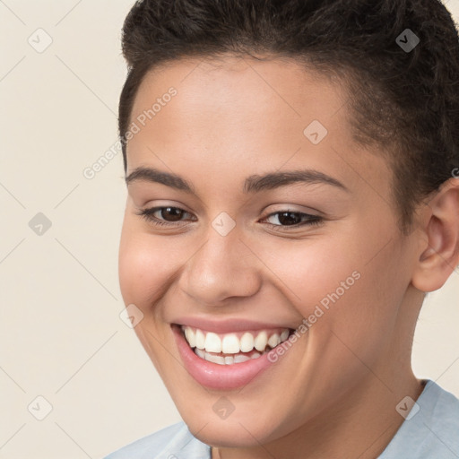 Joyful white young-adult female with short  brown hair and brown eyes