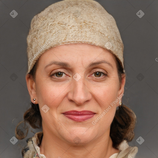 Joyful white adult female with medium  brown hair and grey eyes