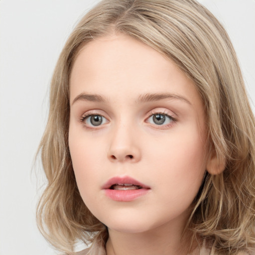 Neutral white child female with long  brown hair and blue eyes