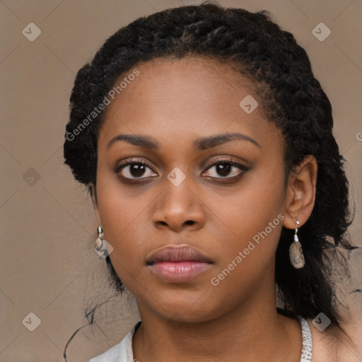 Neutral black young-adult female with long  black hair and brown eyes