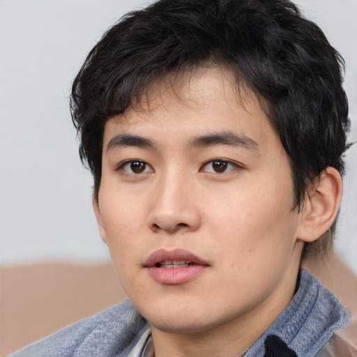 Neutral asian young-adult male with short  brown hair and brown eyes