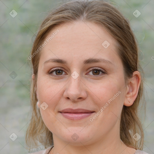 Joyful white young-adult female with medium  brown hair and blue eyes