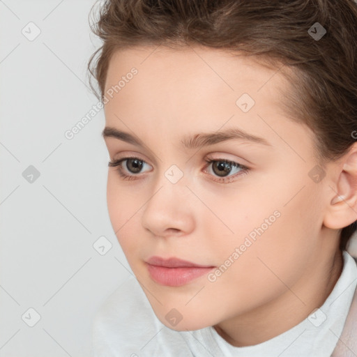 Joyful white child female with short  brown hair and brown eyes