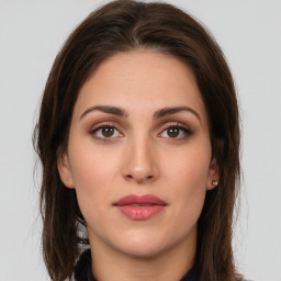 Neutral white young-adult female with medium  brown hair and brown eyes