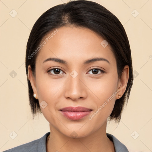 Joyful latino young-adult female with medium  brown hair and brown eyes