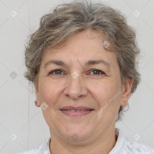 Joyful white middle-aged female with short  brown hair and brown eyes