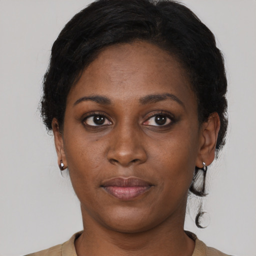 Neutral latino young-adult female with short  brown hair and brown eyes