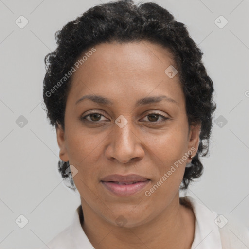 Joyful latino adult female with short  brown hair and brown eyes