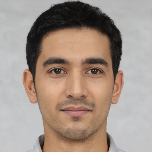 Neutral latino young-adult male with short  black hair and brown eyes