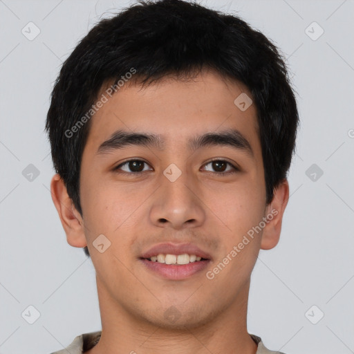 Joyful asian young-adult male with short  brown hair and brown eyes