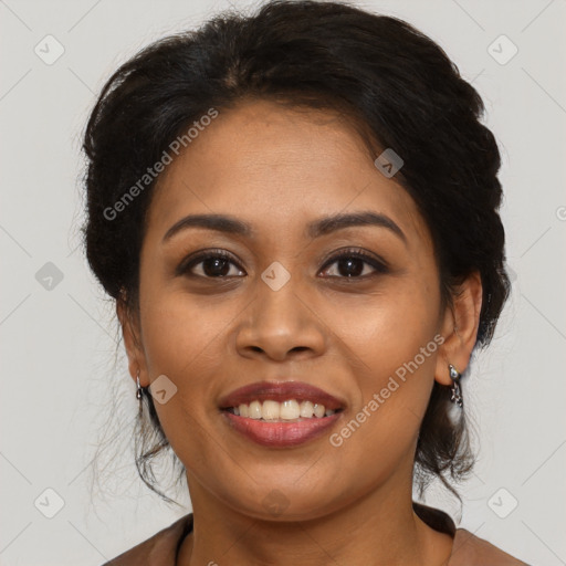 Joyful latino young-adult female with long  brown hair and brown eyes