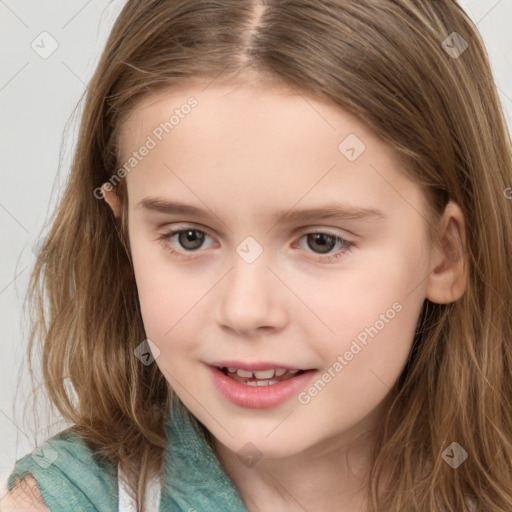 Joyful white child female with long  brown hair and brown eyes