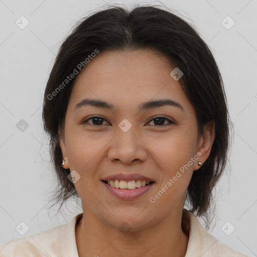 Joyful asian young-adult female with medium  brown hair and brown eyes