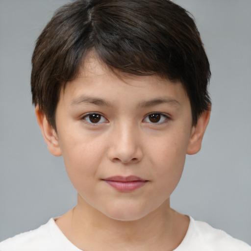 Joyful white child female with short  brown hair and brown eyes