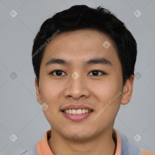 Joyful asian young-adult male with short  black hair and brown eyes