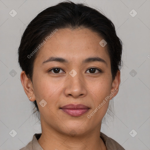 Joyful asian young-adult female with short  brown hair and brown eyes