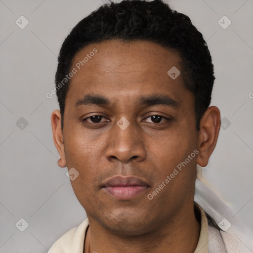 Neutral latino young-adult male with short  black hair and brown eyes