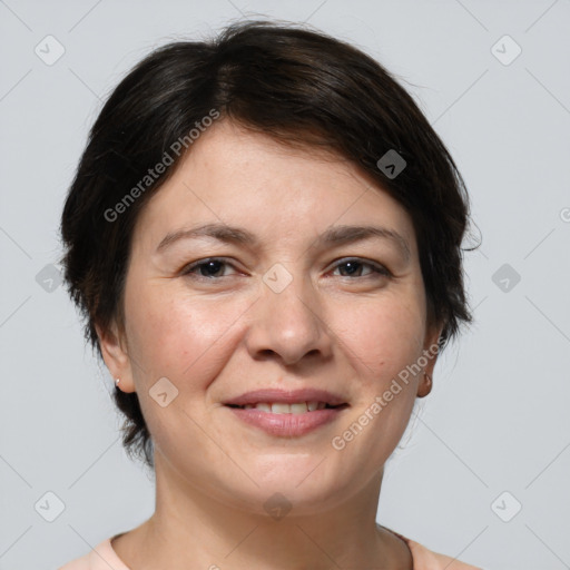 Joyful white adult female with medium  brown hair and brown eyes