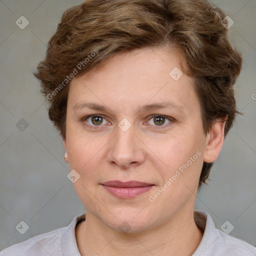 Joyful white adult female with short  brown hair and grey eyes