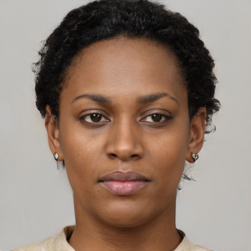 Neutral black young-adult female with short  brown hair and brown eyes