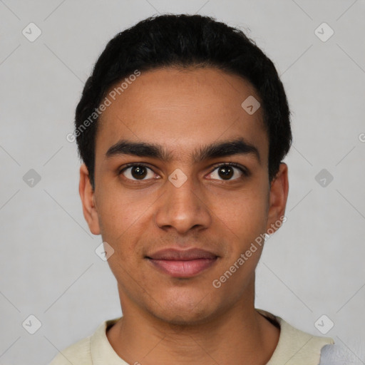 Joyful latino young-adult male with short  black hair and brown eyes