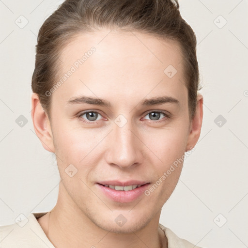 Joyful white young-adult female with short  brown hair and grey eyes