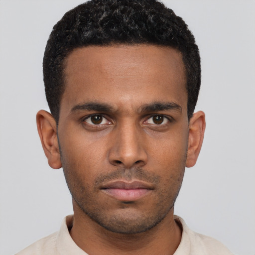 Neutral black young-adult male with short  brown hair and brown eyes
