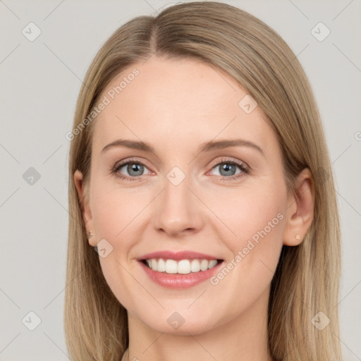 Joyful white young-adult female with long  brown hair and grey eyes