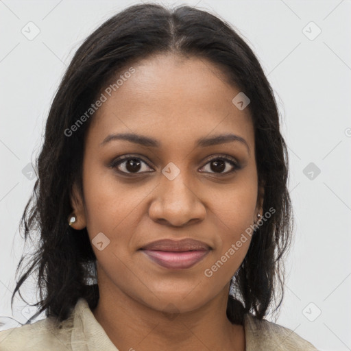 Joyful black young-adult female with long  brown hair and brown eyes