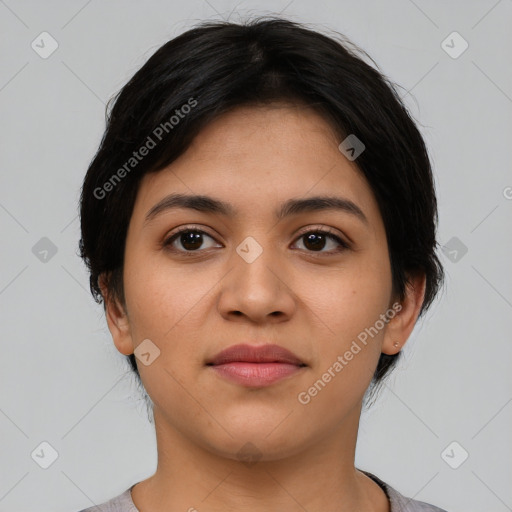 Joyful latino young-adult female with short  black hair and brown eyes