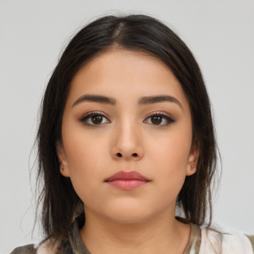 Neutral latino young-adult female with medium  brown hair and brown eyes