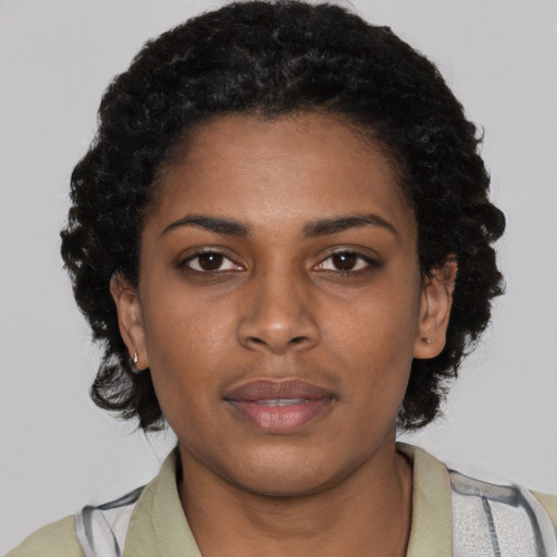 Neutral black young-adult female with short  black hair and brown eyes