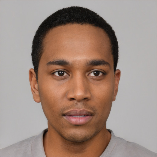 Neutral black young-adult male with short  black hair and brown eyes