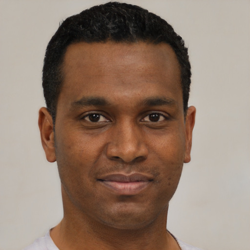 Neutral black young-adult male with short  black hair and brown eyes