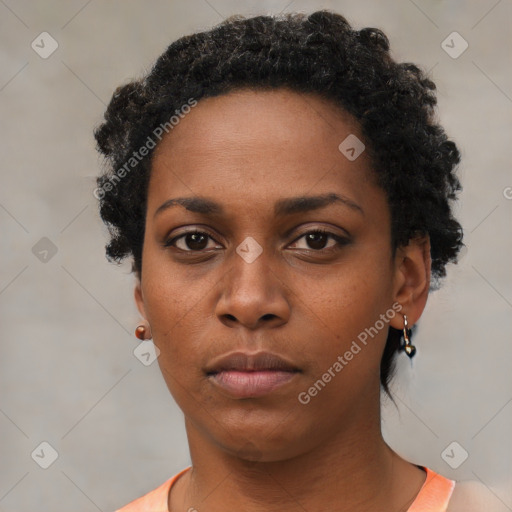 Neutral black young-adult female with short  black hair and brown eyes