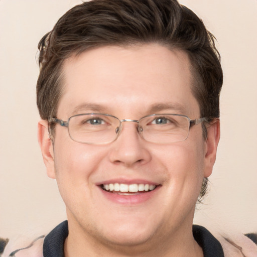 Joyful white adult male with short  brown hair and grey eyes