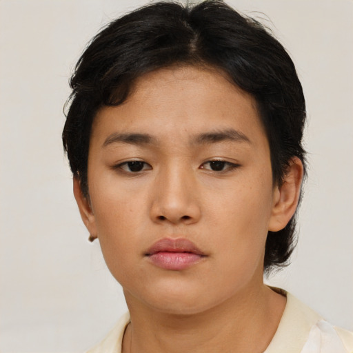 Neutral asian young-adult female with short  brown hair and brown eyes