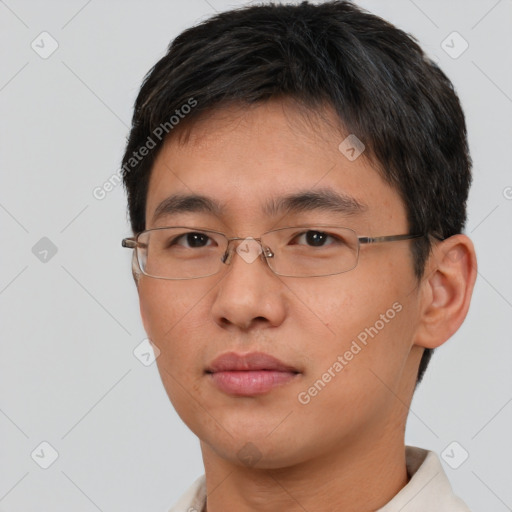 Neutral asian young-adult male with short  brown hair and brown eyes