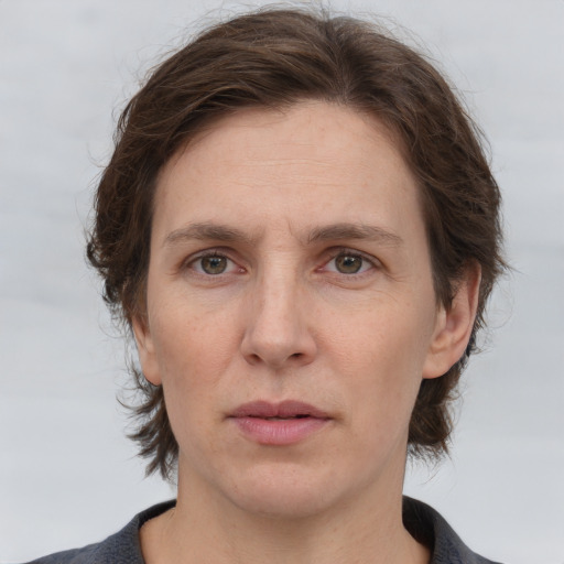 Neutral white adult female with short  brown hair and brown eyes